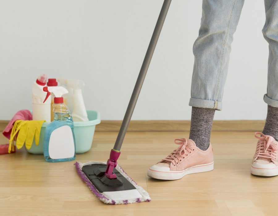 woman-using-mop-clean-floor